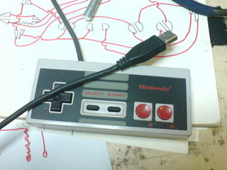 Illustration for article titled DIY NES USB Controller Plays Games, Contains Emulator For Playing More Games